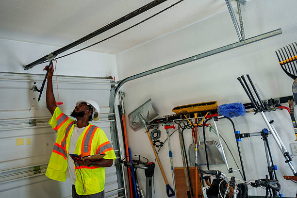 Professional Garage Door Panel Replacement technician working in Shoshone County County, ID